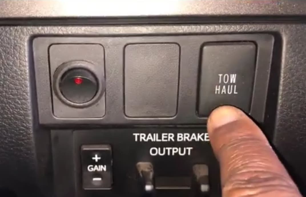 What is The Tow Haul Button Used For